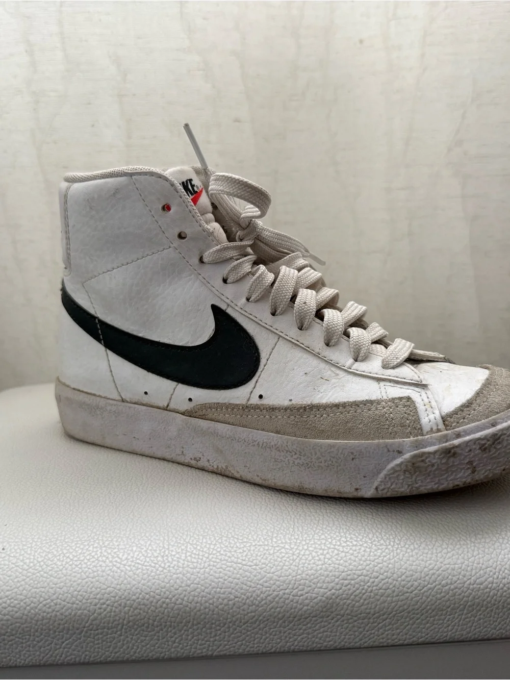 Nike Men’s White High-Top Sneakers with Black Swoosh and Red Tongue Logo